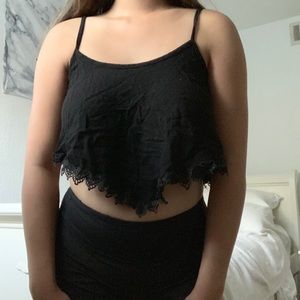 foreign exchange cropped black crocheted tank top